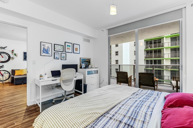 bedroom featuring dark wood-type flooring