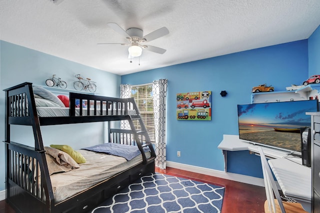 bedroom featuring a textured ceiling, hardwood / wood-style floors, and ceiling fan