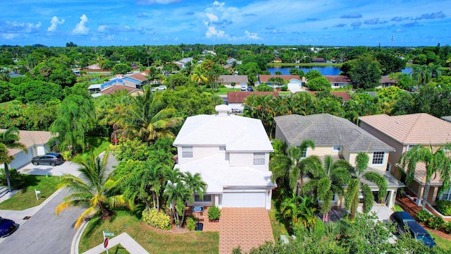 aerial view with a residential view and a water view