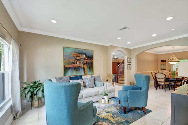 living room featuring light tile patterned floors, recessed lighting, visible vents, and stairs