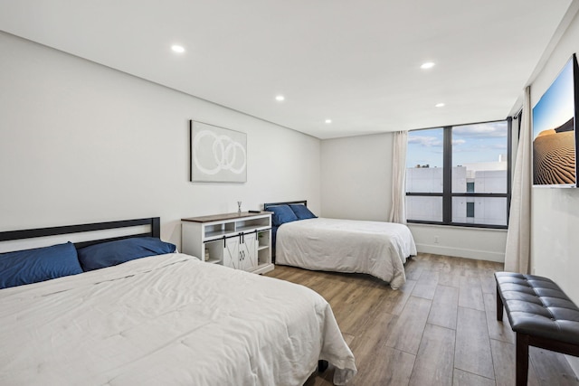 bedroom with hardwood / wood-style floors