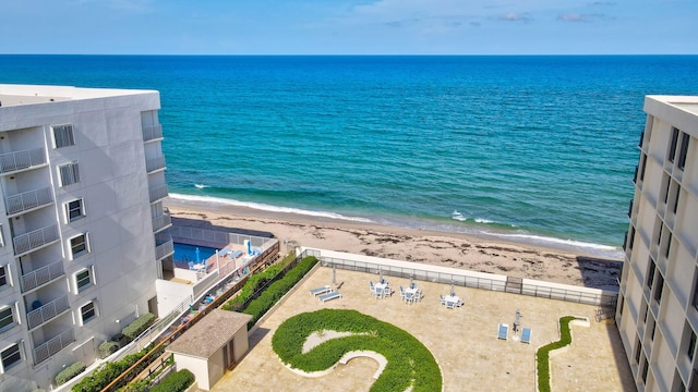 view of water feature with a beach view