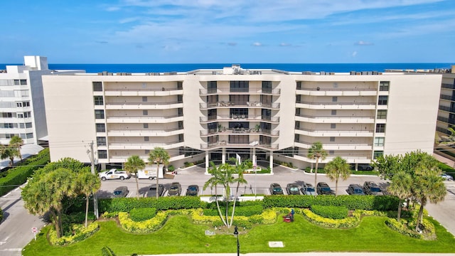 view of building exterior with a water view