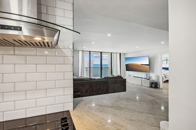 bathroom with plenty of natural light and concrete floors