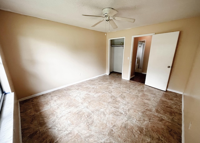 unfurnished bedroom featuring ceiling fan, light tile patterned flooring, and a closet