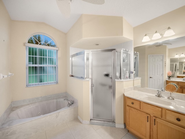 bathroom with vanity, tile patterned flooring, and independent shower and bath