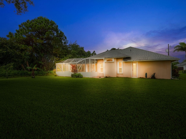 view of front of home featuring a lawn