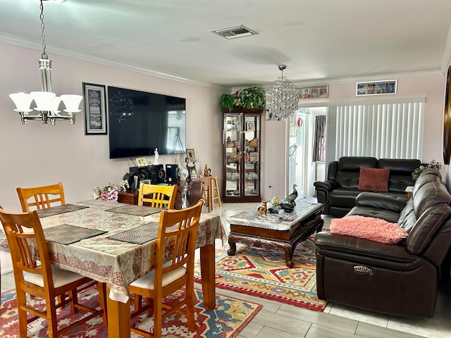 dining space with an inviting chandelier, crown molding, and a healthy amount of sunlight