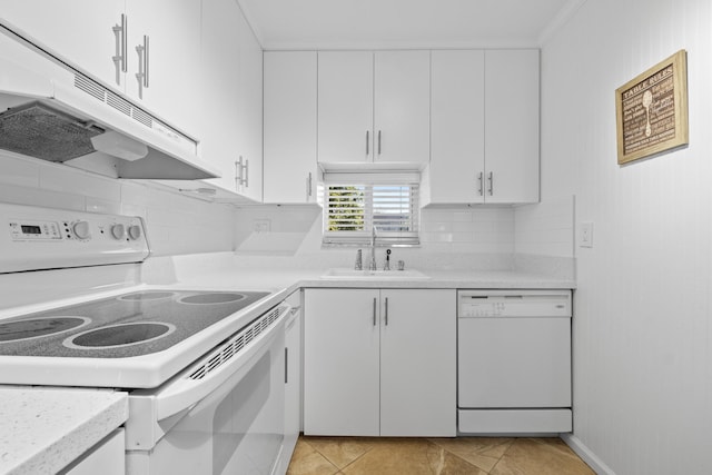 kitchen with light countertops, white cabinets, a sink, white appliances, and under cabinet range hood