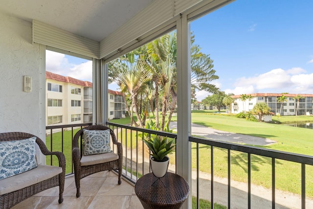 sunroom with a residential view