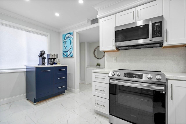 kitchen with appliances with stainless steel finishes, crown molding, white cabinetry, and tasteful backsplash