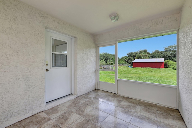 view of unfurnished sunroom