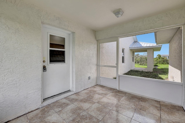 view of unfurnished sunroom