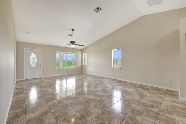 entryway featuring light tile patterned flooring, lofted ceiling, and ceiling fan