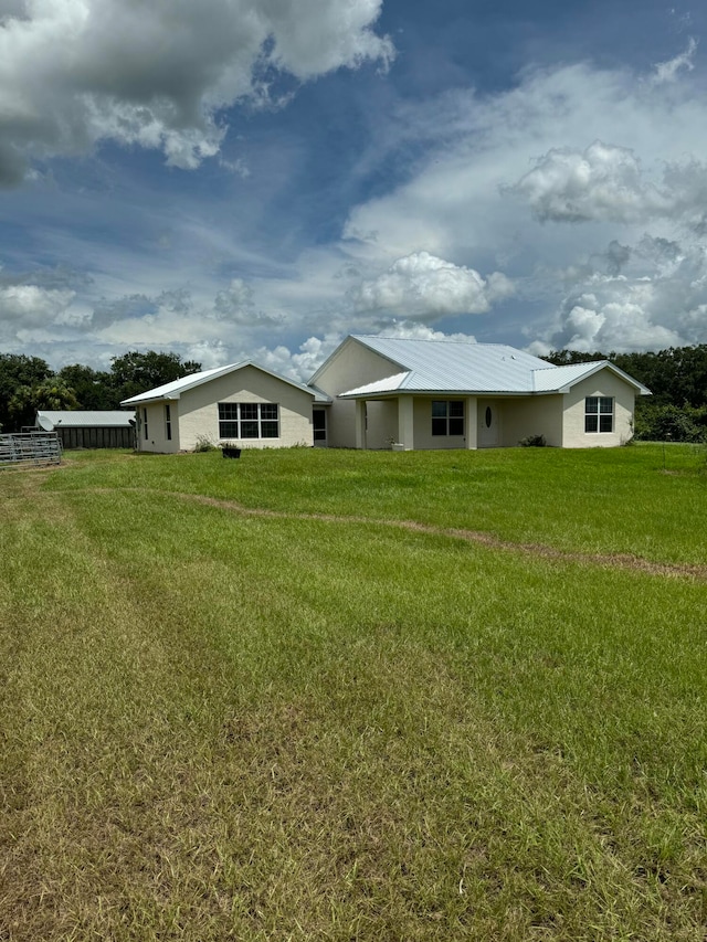 exterior space with a yard