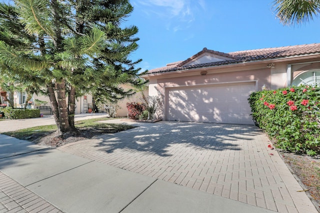 view of front of house with a garage