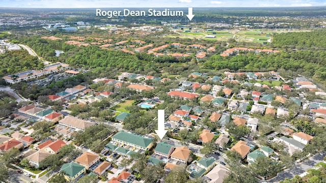 birds eye view of property with a residential view