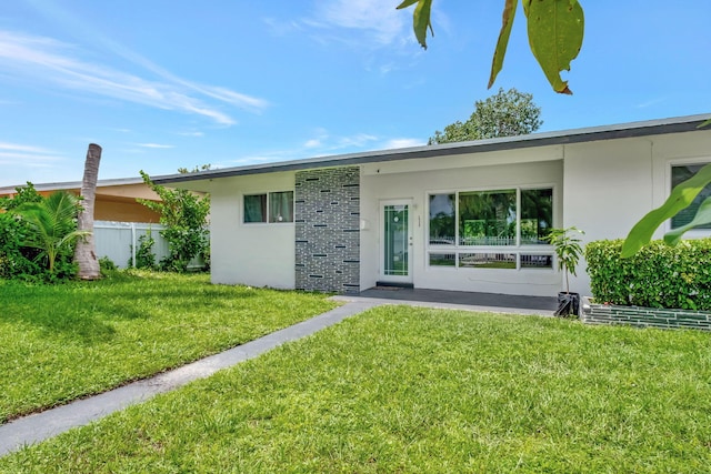 exterior space with a lawn