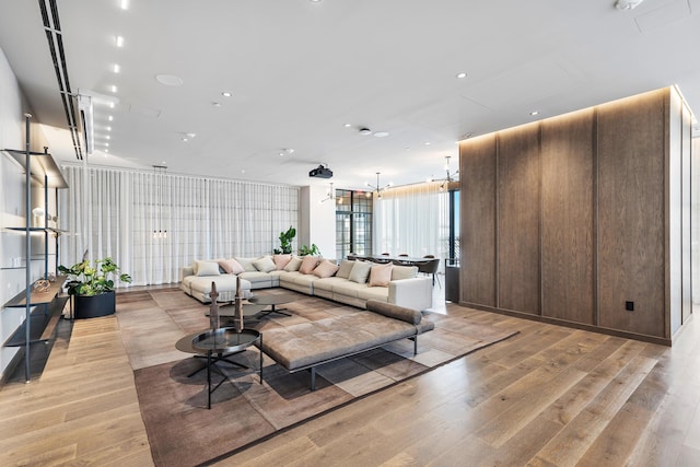 living room with light hardwood / wood-style flooring