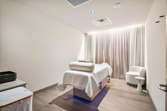 bedroom featuring hardwood / wood-style flooring