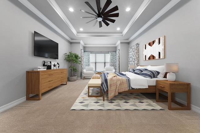 bedroom featuring ceiling fan, ornamental molding, light colored carpet, and a tray ceiling