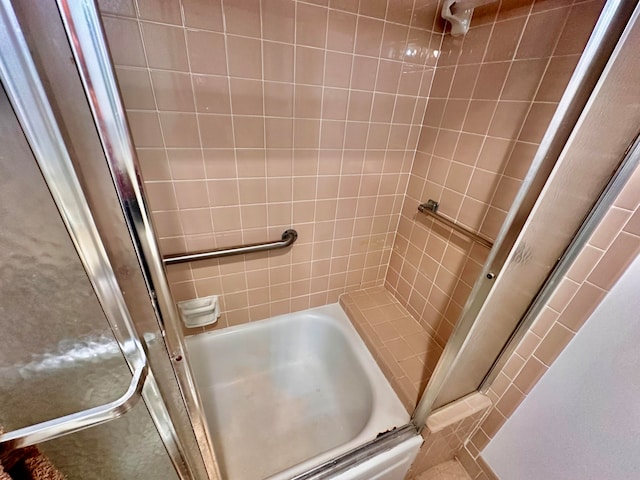 bathroom with separate shower and tub