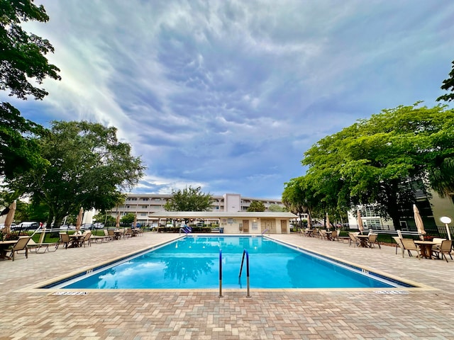 view of pool featuring a patio area