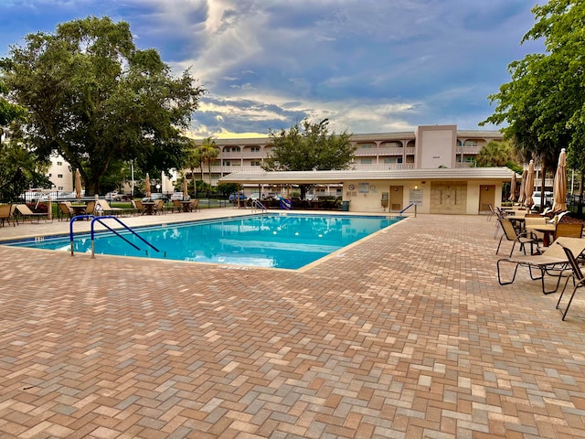 view of pool featuring a patio