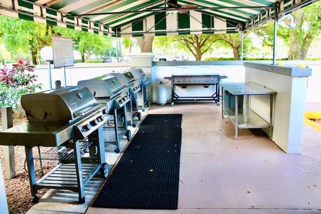 view of patio featuring grilling area and exterior bar