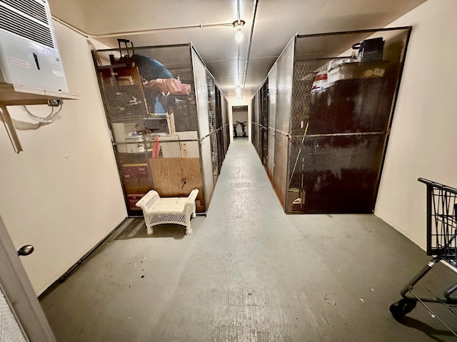 hallway featuring concrete floors