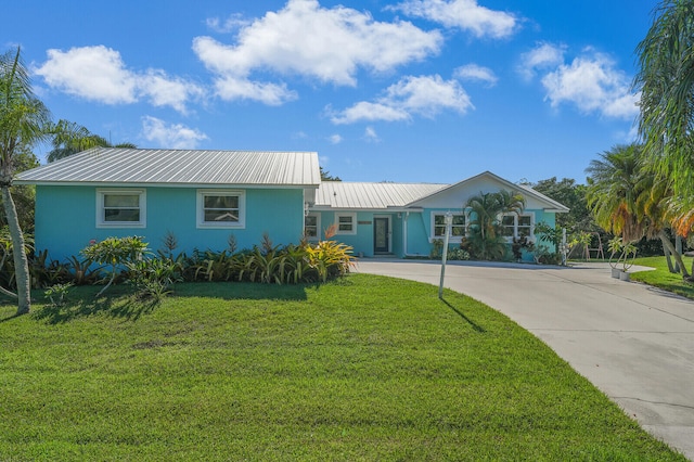 single story home with a front yard