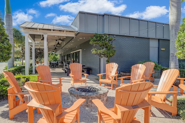 view of patio with an outdoor fire pit