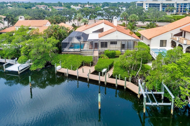 drone / aerial view with a water view