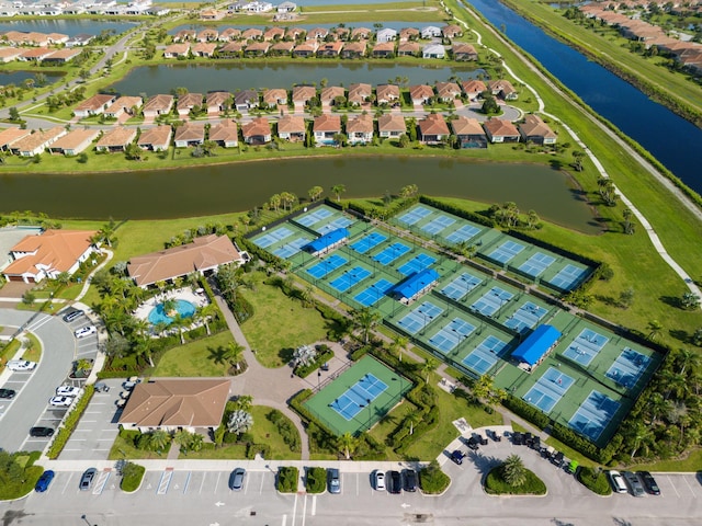 bird's eye view with a water view