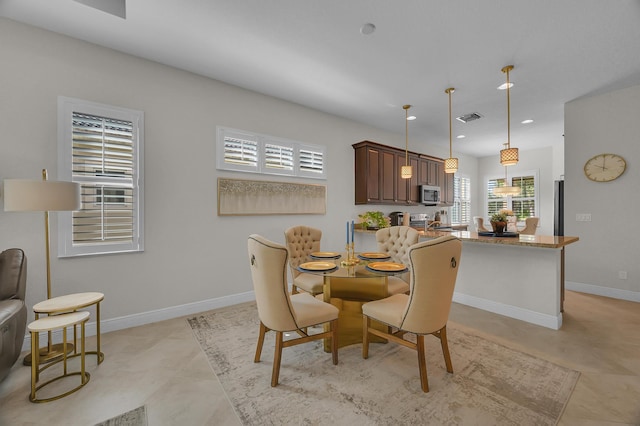 view of tiled dining room