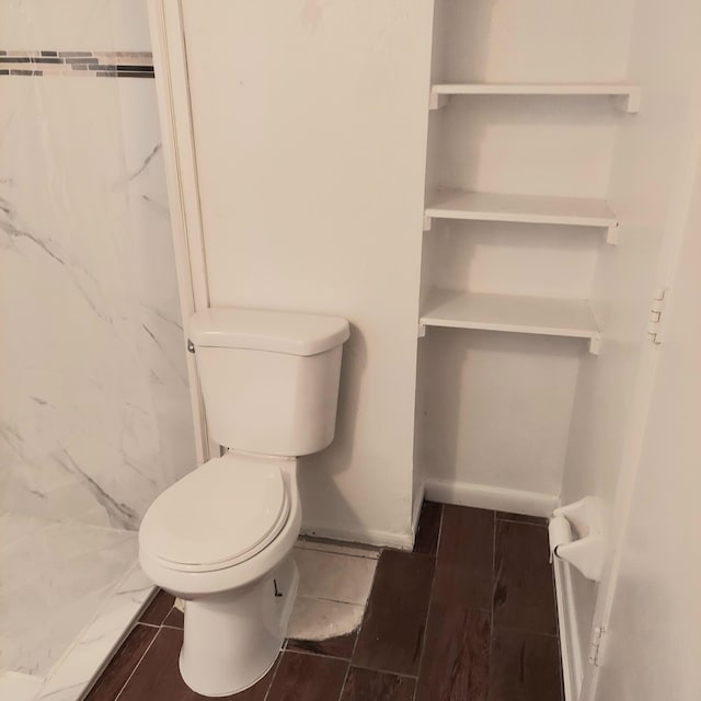 bathroom featuring toilet and hardwood / wood-style flooring