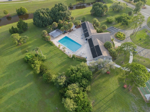 birds eye view of property featuring a water view and a rural view