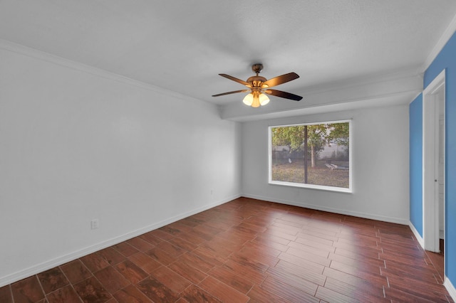 spare room featuring ornamental molding, dark hardwood / wood-style floors, and ceiling fan