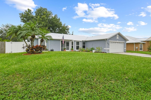 ranch-style house with a front lawn and a garage