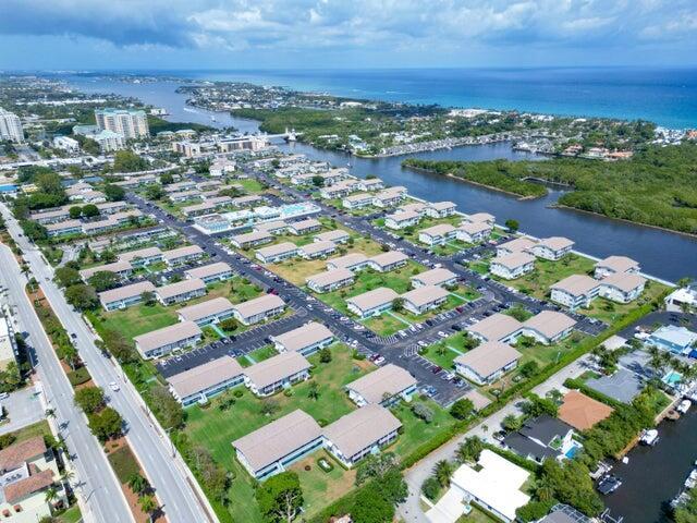 birds eye view of property featuring a water view