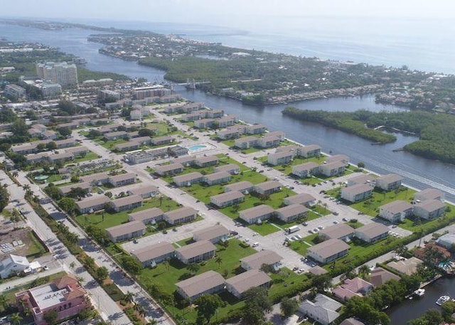 birds eye view of property with a residential view and a water view