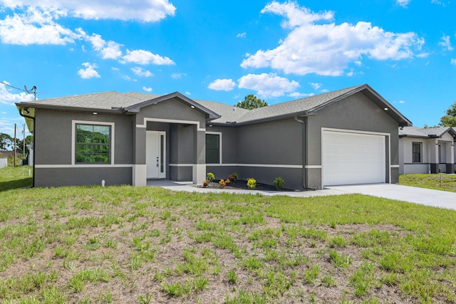 ranch-style house with a front yard and a garage