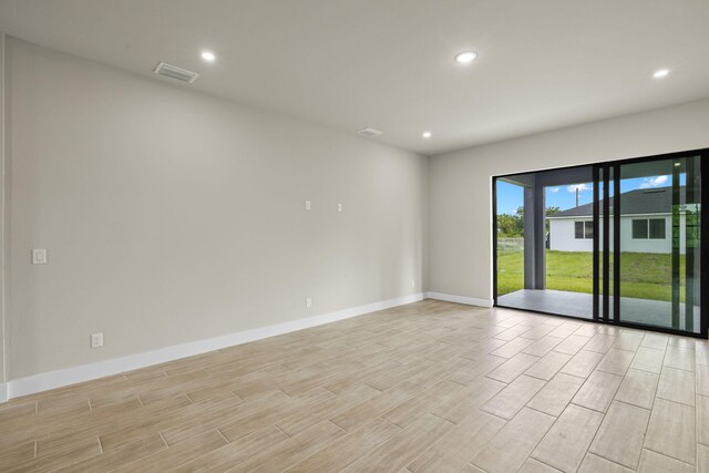 empty room featuring light hardwood / wood-style floors