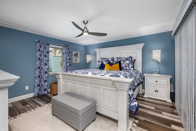 bedroom with ceiling fan, wood-type flooring, and ornamental molding