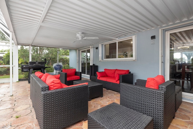 view of patio / terrace featuring area for grilling, outdoor lounge area, and ceiling fan