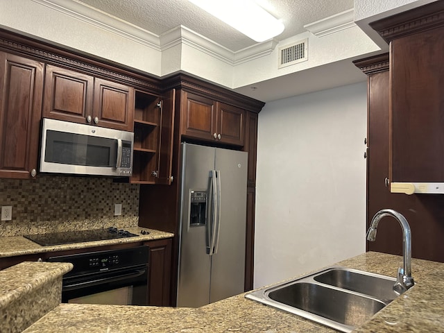 kitchen with sink, dark brown cabinets, tasteful backsplash, black appliances, and ornamental molding