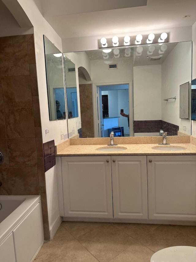 bathroom featuring vanity and tile patterned floors