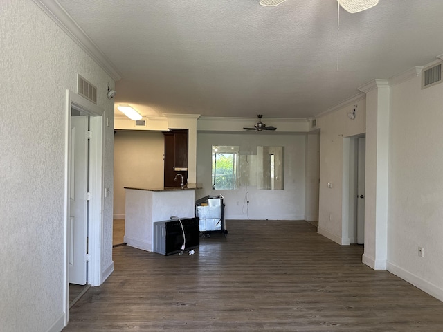 1660 Renaissance Commons Blvd Unit 2218, Boynton Beach, FL 33426 - unfurnished living room featuring crown molding, ceiling fan, visible vents, and dark wood-type flooring