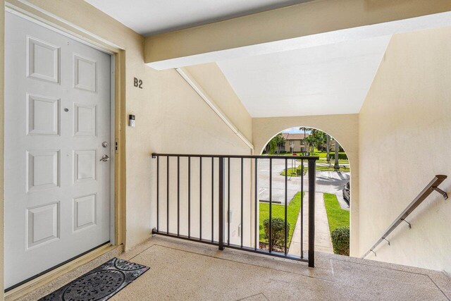 doorway to property featuring a balcony