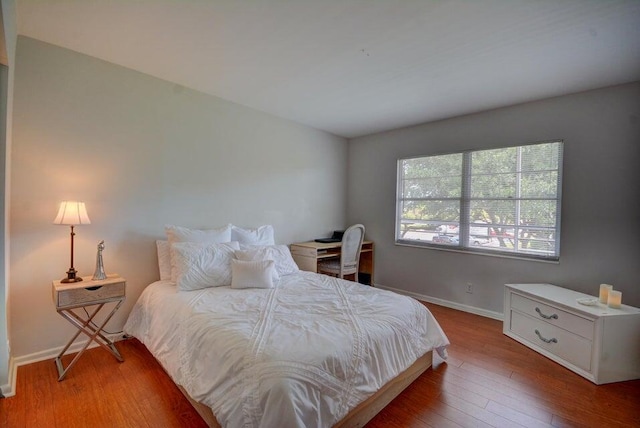 bedroom featuring hardwood / wood-style flooring